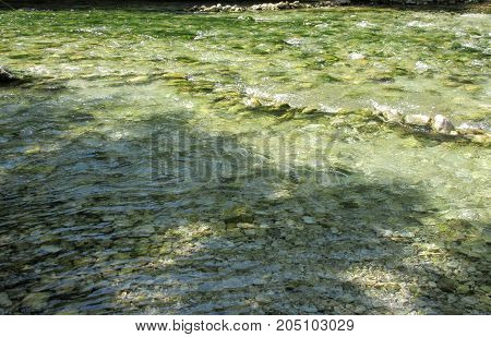 Emerald waters of the Aheron River in the park of Glitsky, Greece.