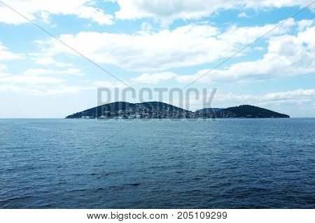 Island under the cloudy sky on Marmara Sea near Istanbul