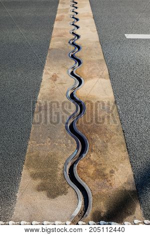 asphalt separation in the highway bridge roadway