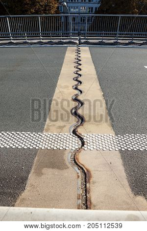 asphalt separation in the highway bridge roadway