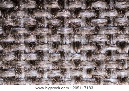 Grey fabric background made of wool textile