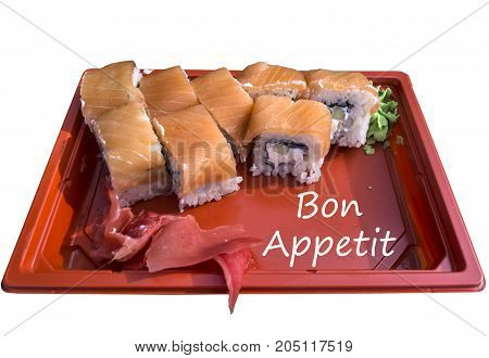 Rolls with salmon and pickled ginger on a red tray isolated on white background with an inscription Bon appetit.