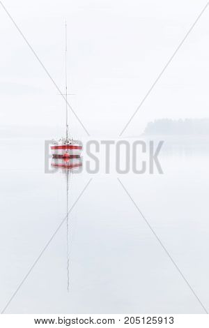 Single boat in a misty day in Alava
