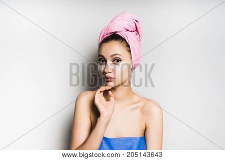 Surprised girl with a mask under the eyes