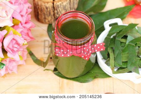 Bamboo grass juice or Tiliacora triandra (bai-ya-nang)