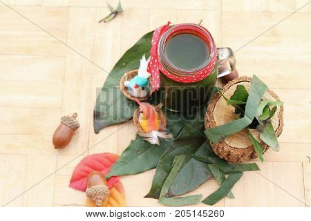 Bamboo grass juice or Tiliacora triandra (bai-ya-nang)