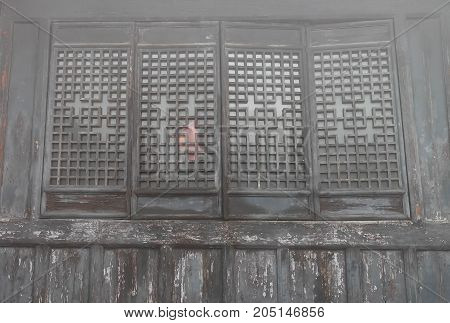The old window in the chinese templeMade of the wood. At the Wudang Mountain 2017 SEP 09Hubei China