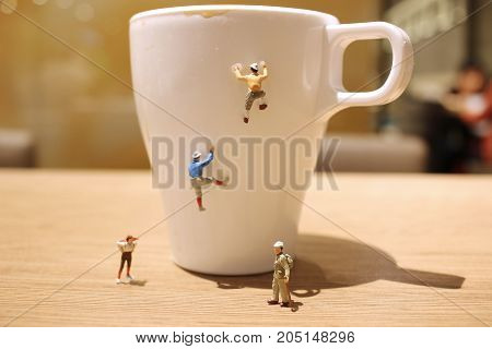 Fun Of Mini Tiny  People Climbing The Mug