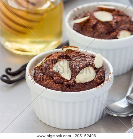 Healthy vegan dessert with avocado cocoa vanilla honey and almond milk chocolate mousse square format