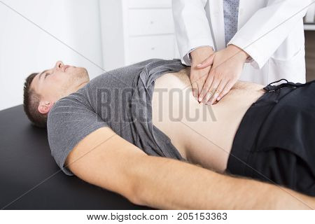 A Doctor examining her patient in medical office