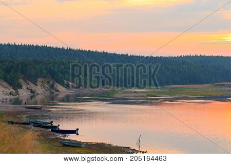 The river Varzuga, Northern Russia, the fishing boats
