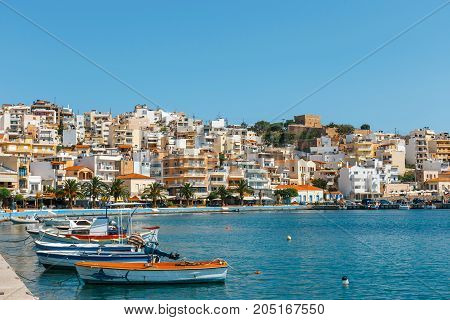Sitia, Crete, Greece - June 11, 2017: Seaport Of Sitia Town With Moored Traditional Greek Fishing Bo
