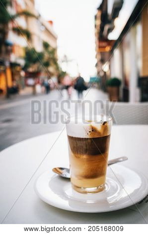 Traditional barraquito coffee on table lifestyle Tenerife Canary island Spain