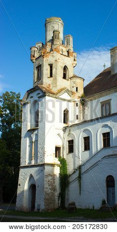 In the foreground is Breclav tower from castle in the background is blue sky with white clouds.