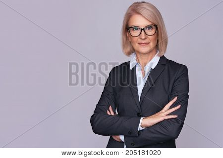Smile Senior Business Woman With Folded Hands