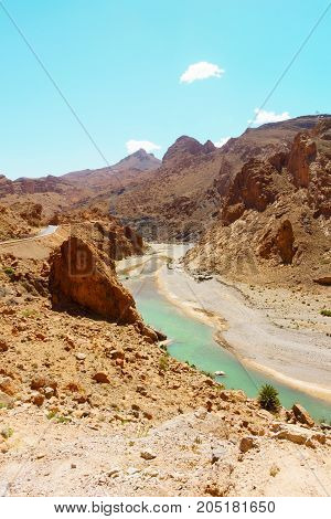 The Ziz river flowing through the Middle Atlas mountains in Morocco Africa.