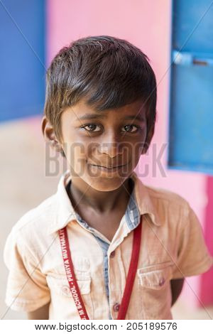 PONDICHERY PUDUCHERY INDIA - SEPTEMBER 04 2017. Unidentified child at schhol behind the window