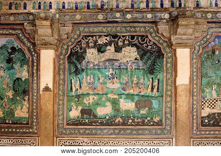 India detail of the decorated wall in the palace in the Bundi city in Rajasthan