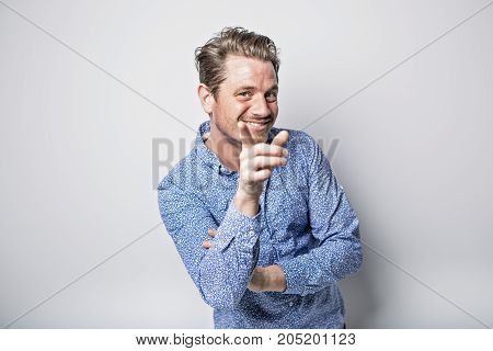 A Portrait of european man isolated over white background. Caucasian male model in studio shoot.