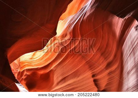 Swirls of old red sandstone wall abstract pattern in the Upper Antelope Canyon Page Arizona USA.