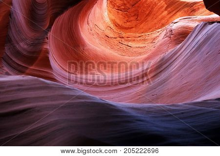 Swirls of old red sandstone wall abstract pattern in Upper Antelope Canyon Page Arizona USA.