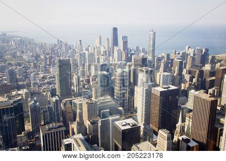 Chicago skyline and lake Michigan. An overhead view of the great city of Chicago downtown taken from the Willis (Sears) Tower. Horizontal composition.