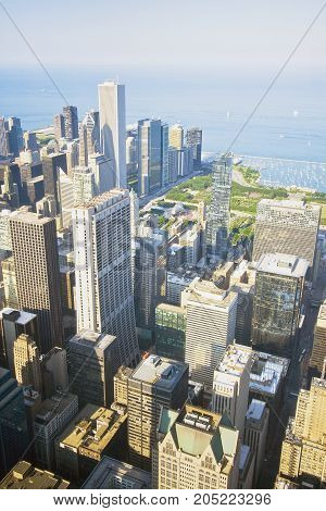 Chicago skyline and lake Michigan. An overhead view of the great city of Chicago downtown taken from the Willis (Sears) Tower. Vertical composition.