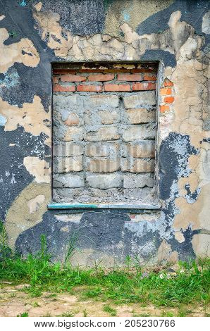 Creative wall background. Walled window and old ruined wall.