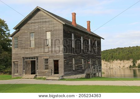 A weathered wooden building in Fayette Historic State Park,Upper Peninsula of Michigan