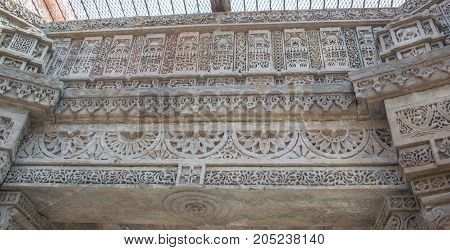 Fine carving of 18th century in Adalaj steps well or waav
