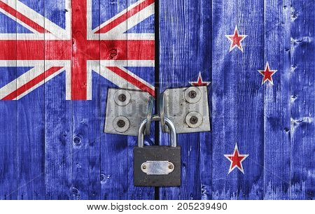 New Zeland flag on door with padlock close