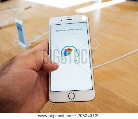 PARIS FRANCE - SEP 22 2017: New iPhone 8 and iPhone 8 Plus as well the updated Apple Watch Apple TV goes on sale today in Apple Store with customer point of view at memorando App