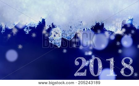 2018 on absctract frizen ice and snow background