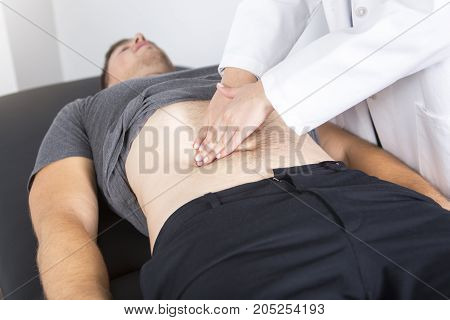 A Doctor examining her patient in medical office