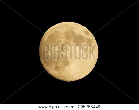 Photo of moon phase catching craters on it's surface