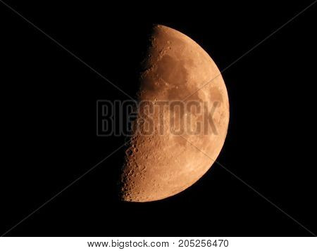 Photo of moon phase catching craters on it's surface
