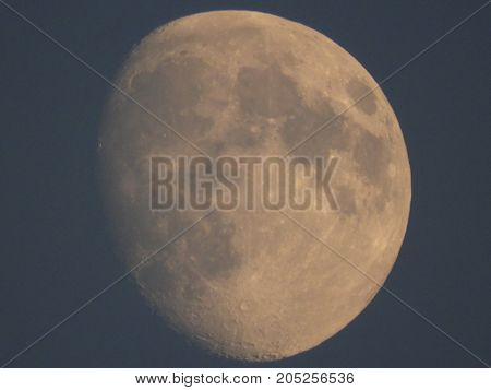 Photo of moon phase catching craters on it's surface
