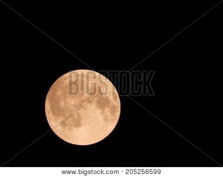 Photo of moon phase catching craters on it's surface