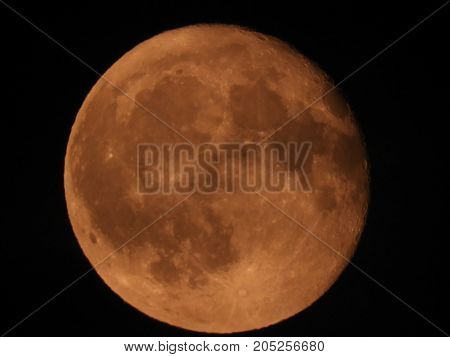 Photo of moon phase catching craters on it's surface