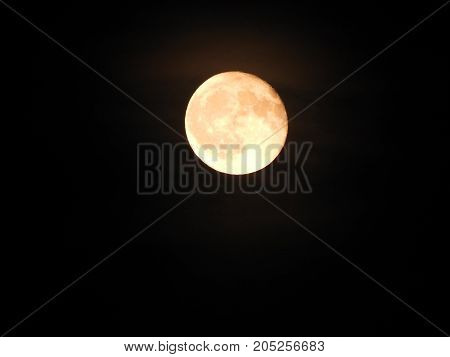 Photo of moon phase catching craters on it's surface