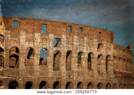 Old photo with view outside the Colosseum Rome Italy. Specific ruins and sky with clouds in background. Vintage processing.