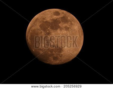Photo of moon phase catching craters on it's surface