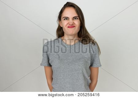 Pretty Woman Writhes Her Face