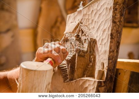 Sculptor Hands Working Wood