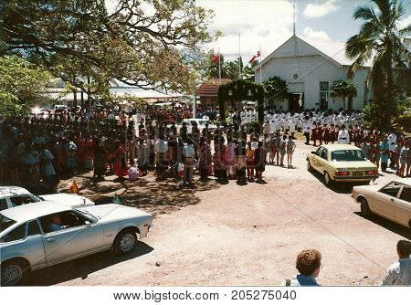 NUKU'ALOFA, TONGATAPU / TONGA - CIRCA 1990: Tongan people gather to watch a parade during a national holiday.