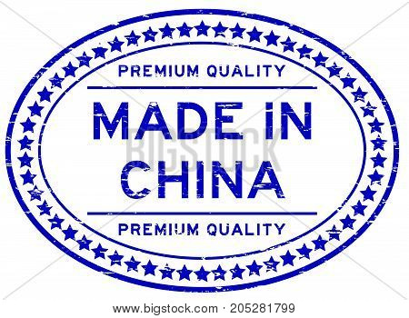 Grunge blue premium quality made in China oval rubber seal stamp on white background