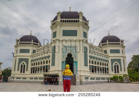 MEDAN, INDONESIA - SEPTEMBER 19,2017 : Great Mosque of Medan or Masjid Raya Al Mashun is a mosque located in Medan, Indonesia. The mosque was built in the year 1906 and completed in 1909 and one of the largest mosques in Medan
