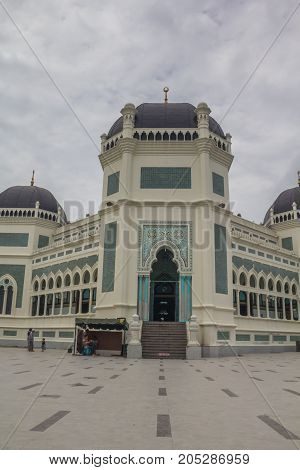 MEDAN, INDONESIA - SEPTEMBER 19,2017 : Great Mosque of Medan or Masjid Raya Al Mashun is a mosque located in Medan, Indonesia. The mosque was built in the year 1906 and completed in 1909 and one of the largest mosques in Medan
