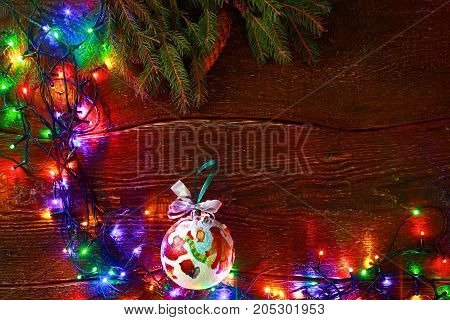 Christmas rustic background - vintage planked wood with lights and free text space.