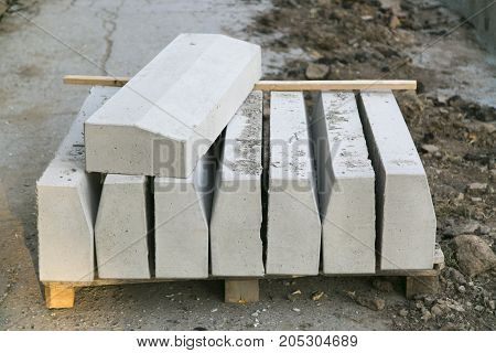 The repair of the road. Pictures of repairing of pedestrian sidewalk. Setting the border